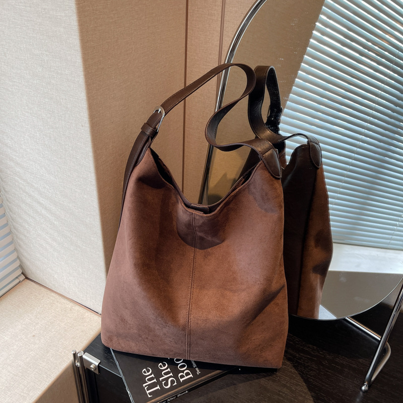 Bolsa retro esmerizada de terro para mujeres 2025 nueva gran capacidad de viaje de un solo hombro bolsas de cubo bolsas de ocio