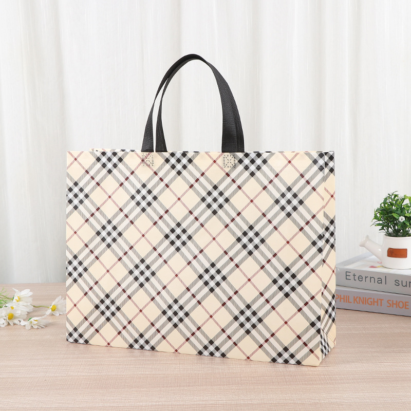 Bolsa de mano no tejida multi-especificación plegable con regalo de mano bolsas de compras de mano logotipo impresa en color bolsas de tela no tejida