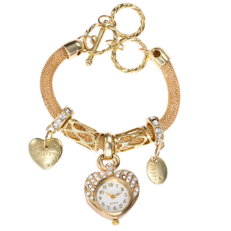 Reloj de pulsera de mujer ins moda Diamante Oro Corazón de melocotón reloj de temperamento decorativo estudiante femenina reloj de aleación de cuarzo