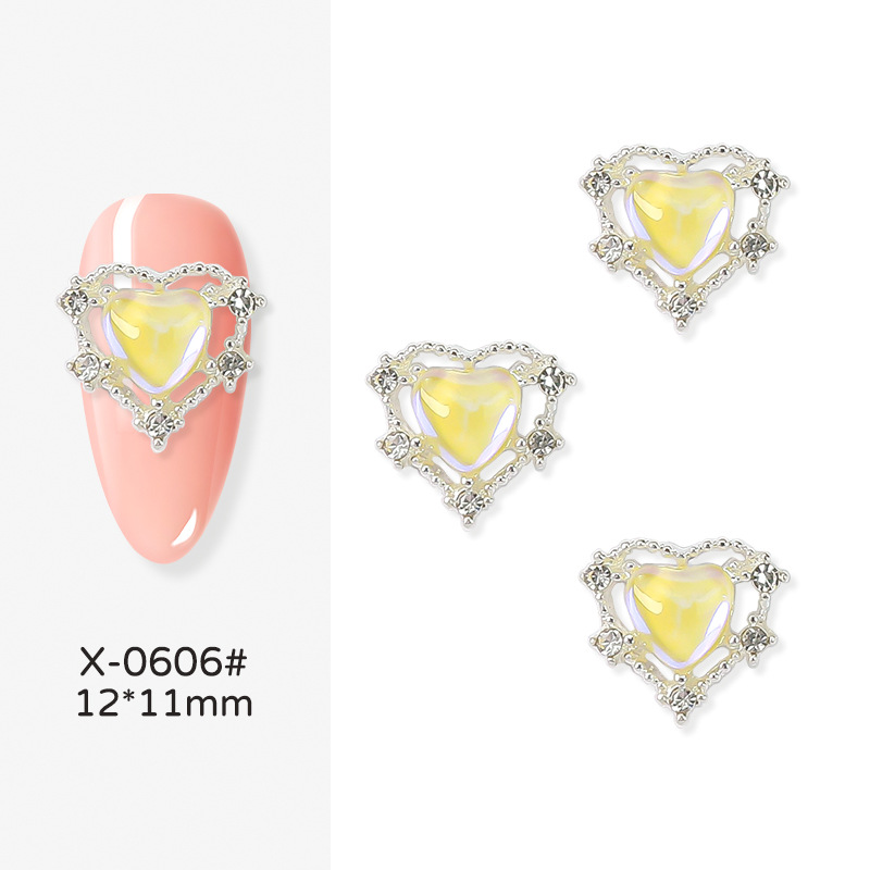 Nueva joyería de uñas Rojas netas Nueva Aurora en forma de corazón de diamantes de oro y plata Corazón de melocotón Diamante grande linda chica bonita yema de los dedos decoraciones