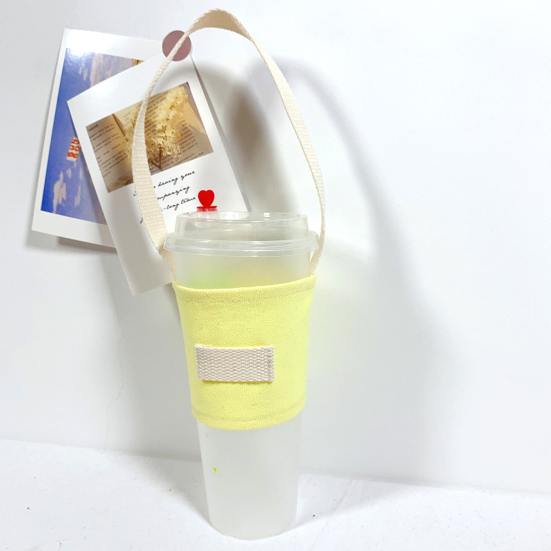 Fábrica al por mayor color sólido leche taza de té cubierta lona embalaje bebidas portátil bolso café taza mano