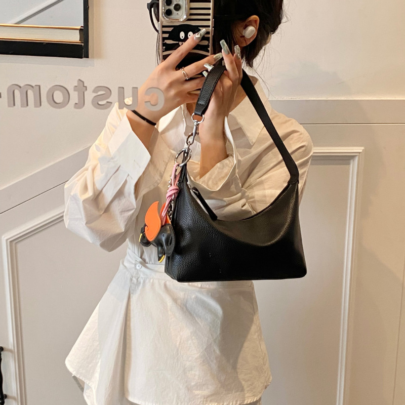 レトロ小衆デザイン枕バッグ女性春夏2025韓系ファッションシングル肩腋の下PU質感ショルダーバッグ|undefined