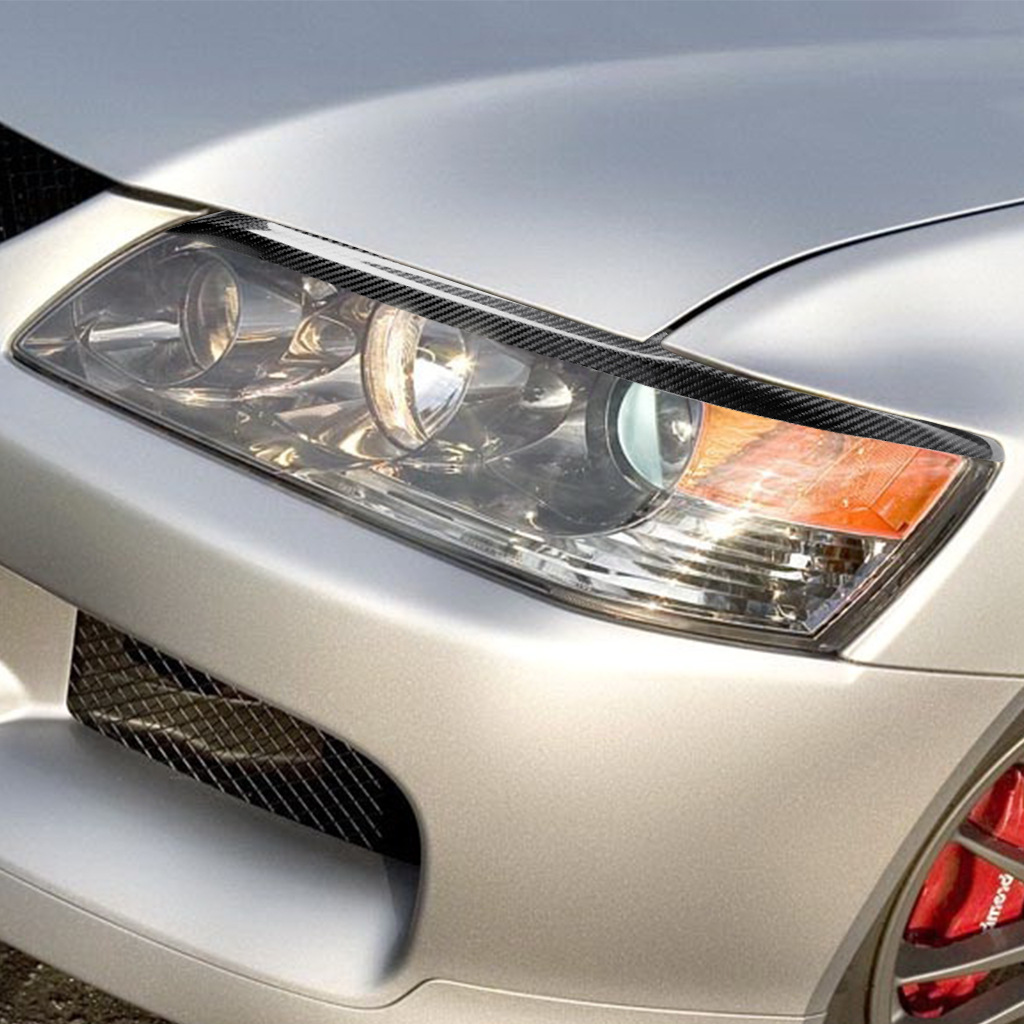 Suitable for 03-07 Mitsubishi EVO7-9 generation carbon fiber modified lamp eyebrow headlight decorative strip lamp eyebrow patch