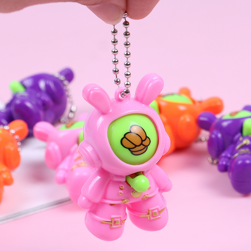Mini boxeo de adivinación conejo de rábano pequeño juguete promocional pequeño premio tijeras tela de piedra juego huevo colgante llavero
