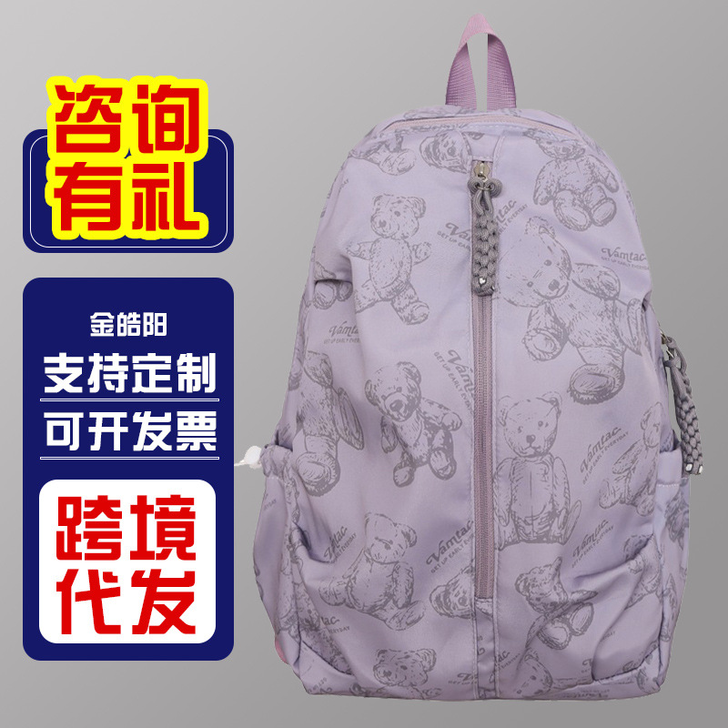 2025 nueva mochila de impresión de dibujos animados para estudiantes de secundaria femenina versión coreana universal mochila de viaje ligera simple