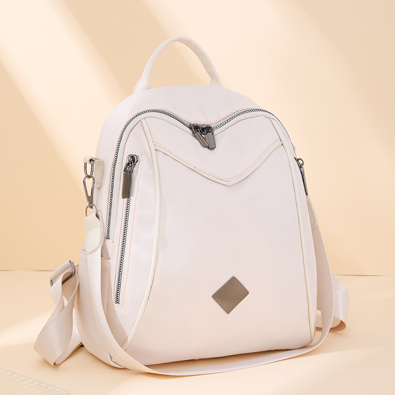 Mochila femenina 2024 nueva moda coreana de nailon de gran capacidad mochila de viaje de ocio ligero al por mayor