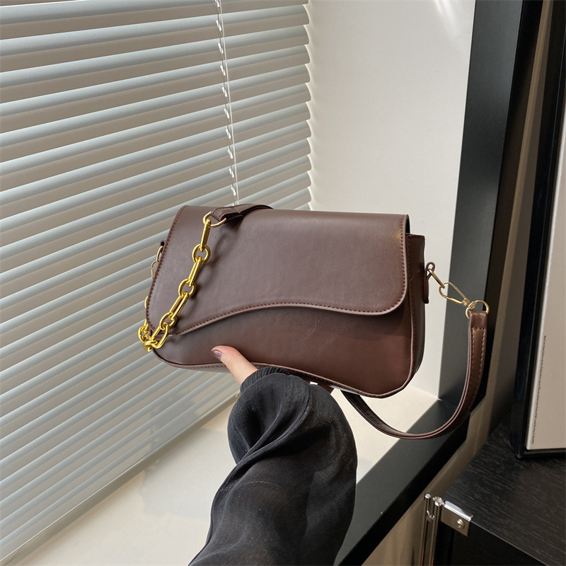 Bolso de mujer de alta calidad 2024, nuevo nicho de moda extranjera sensación de estilo de viaje simple cadena de empalme retro mochila