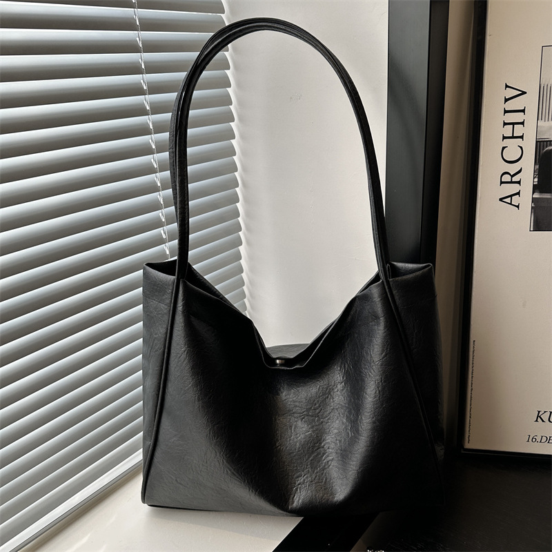 Bolsa de mano casual coreana para mujeres 2024 nueva moda de alta capacidad bolso de hombro de estilo minimalista bolso de mujer de viaje al trabajo