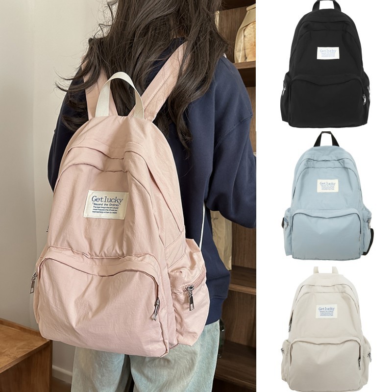 2025 nueva mochila para estudiantes universitarios japoneses, mochila escolar ligera, mochila de viaje simple, impermeable y de gran capacidad