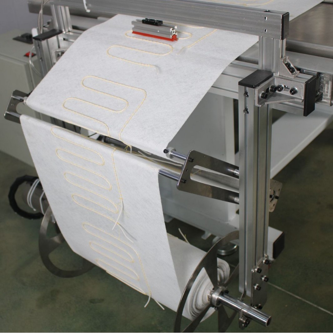 Máquina de cableado de computadora de patrón de cableado de alambre de calefacción de placa de calentamiento de marca de caballo de costura Tongda