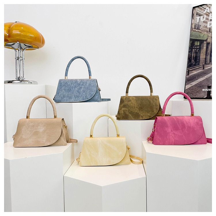 Bolsos de textura extranjera para mujeres 2024 nuevo estilo de este año, bolsos de mochila de moda, bolsos de mano de moda, tendencia