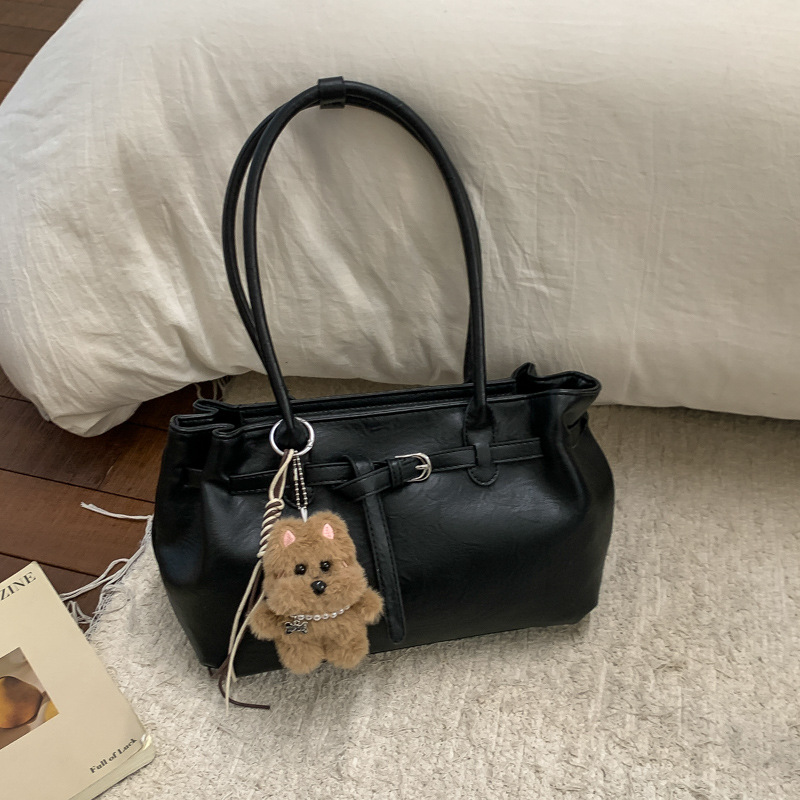 Otoño y invierno bolsas de mano de viaje de mujer bolsas retro de gran capacidad 2025 nuevas bolsas de hombro y brazales casuales versátiles
