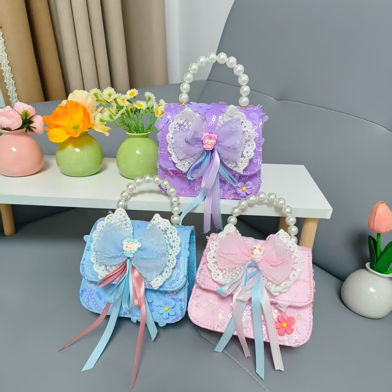 Bow princess pearl bolso Melody KT felino mochila accesorios de chicas pequeñas cadenas de viento fragante bolso para niños