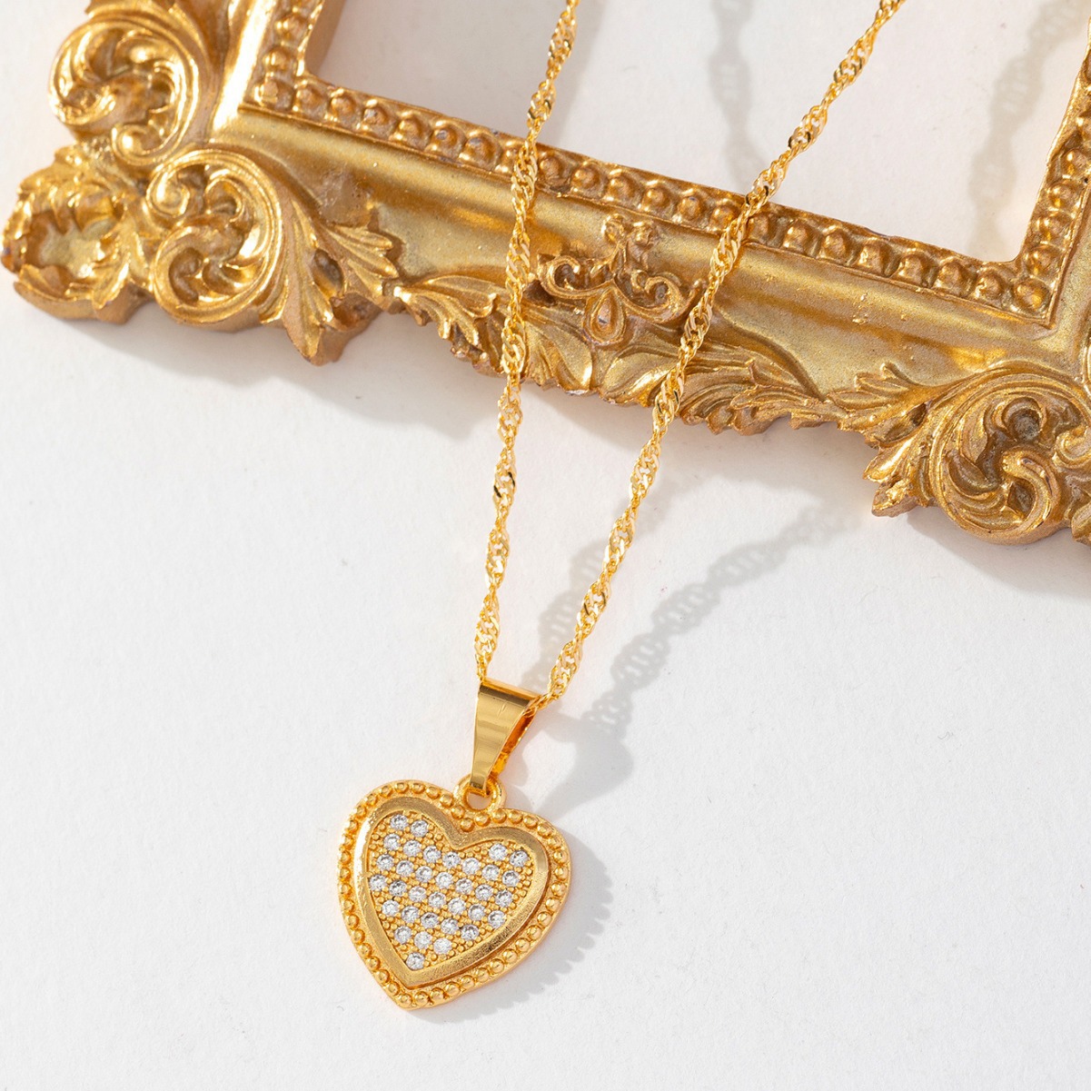 Luz lujosa atmósfera llena de diamante nicho de diseño de corazón de melocotón sensación de viento cadena de suéter coreano colgante de collar