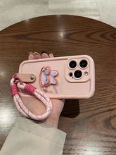可爱粉色兔子支架手绳适用iPhone14promax手机壳15苹果13/12/11