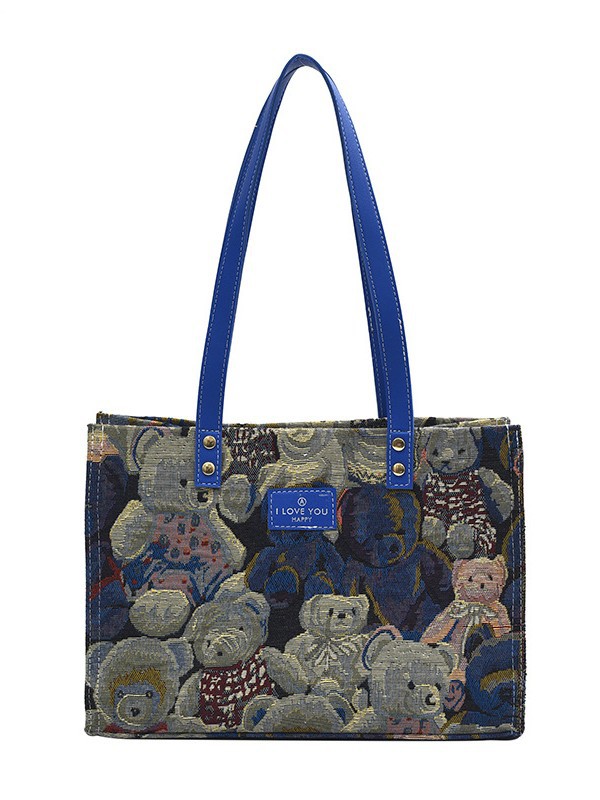 Bolsa de lona impresa de dibujos animados para mujeres 2024 nueva bolsa de gran capacidad, bolsa de hombro de viaje casual versátil