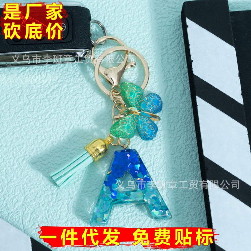 Manufacturer Supplies and Sells Blue-Green Sequin 26-Letter Alphabet Keychains with Butterfly Tassels, Key Pendants for Women's Bags