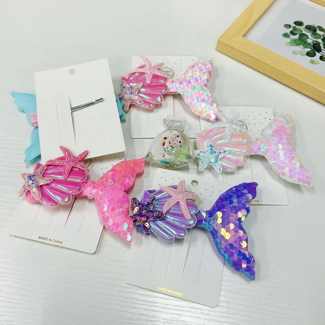 Nueva horquilla de cola de pescado lado brillante horquilla rota lentejuelas para niños show girls shell bangs clip