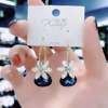 Crystal, fashionable demi-season earrings, 2024 years, cat's eye, internet celebrity, bright catchy style