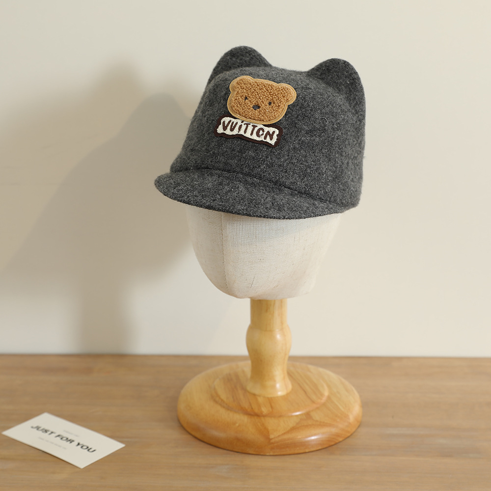 La nueva gorra de orejas de oso lindo y súper lindo niño coreano bebé masculino y femenino otoño e invierno cálido sombrero de copa de lana