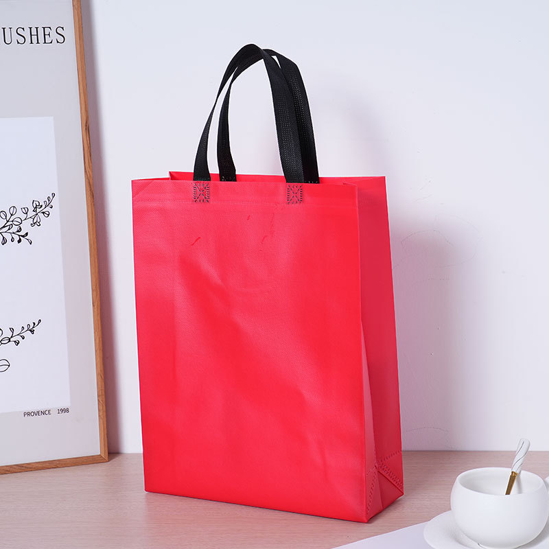 Tienda de ropa gran bolsas de tela no tejida recubiertas logotipo bolsas de compras coloridas regalos bolsas de tela no tejida sensación alta