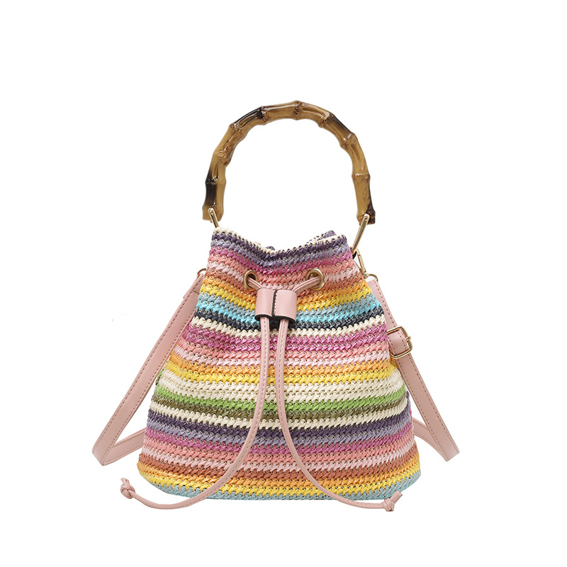 Bolso de cubo de vacaciones junto al mar 2025 nuevo bolso de bambú bolso de hombro de color de contraste tejido de paja bolso de mensajero para mujer de playa