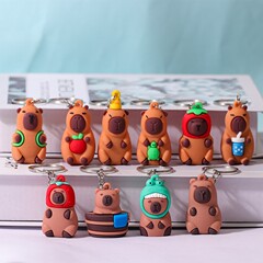 カピバラのカピバラの子供のキーホルダーはかわいいカップルのアイデアの漫画の自動車の包みの小さい贈り物を掛けて飾ります。