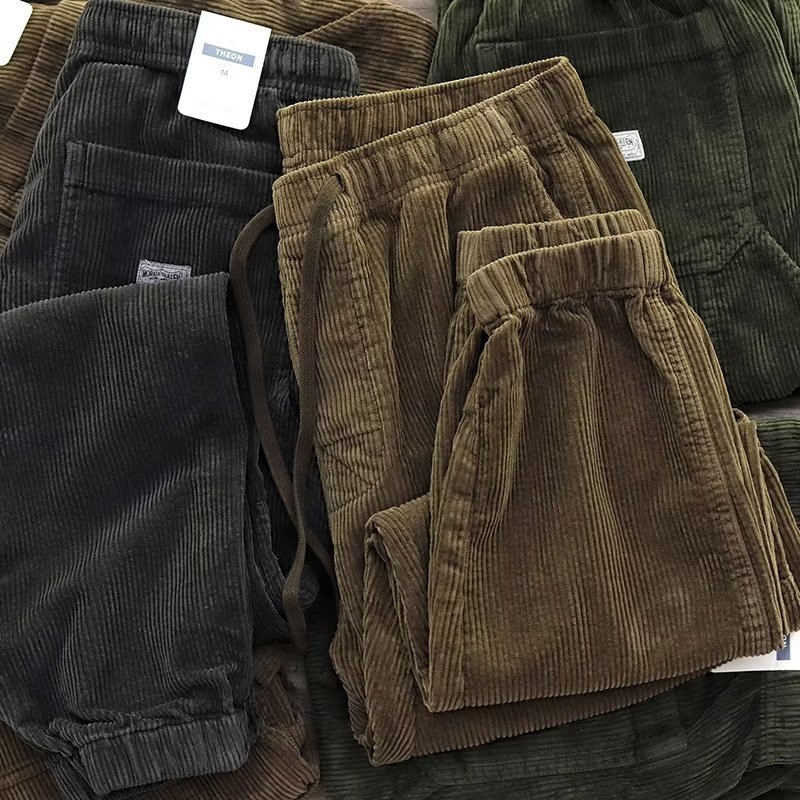 Otoño e invierno europeo y americano Nueva moda micro cintura elástica con cordón ropa de trabajo pantalones atados al tobillo pantalones casuales de pana retro para hombres