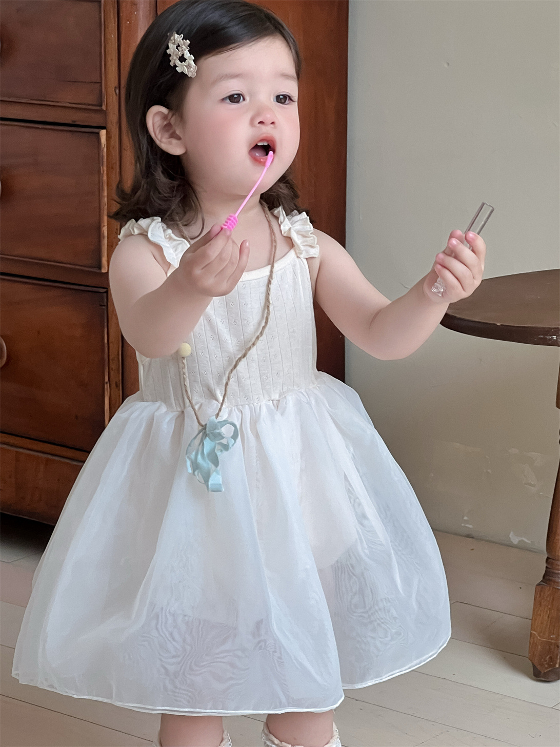 Vestido de malla para niñas, estilo fino de verano, ropa para niños coreanos, falda de trasero con correa de bebé, falda de princesa nueva 2025
