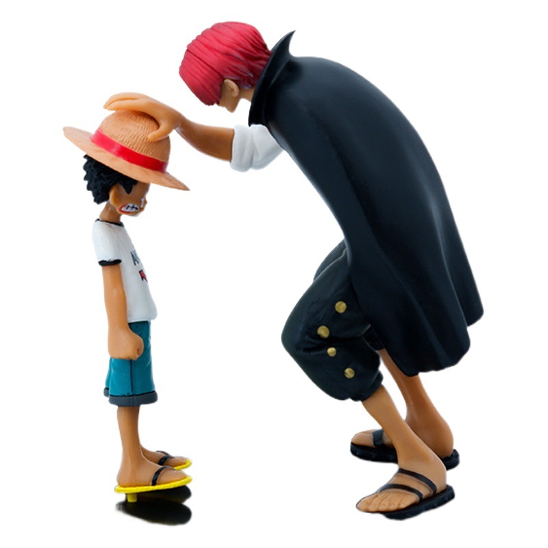 Una pieza periférica sombrero de paja Luffy pelo rojo toque cabeza xiangx bolsa de escena hecha a mano modelo de coche Decoración