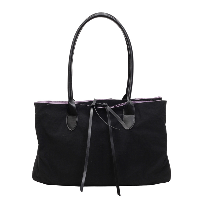 2026 nuevo paquete de moda de tela de alta capacidad, bolso de hombro de alta calidad, bolso de bolsillo pequeño y multifuncional.