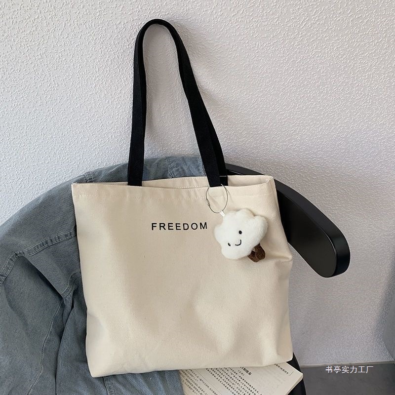 原创学生单肩帆布包上课通勤上班手提袋大容量简约百搭帆布袋