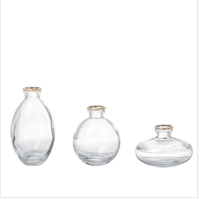 Alto valor de belleza ligero mini creativo pequeño jarrón conjunto de artesanía decoración de escritorio transparente flor decoración de sala de estar