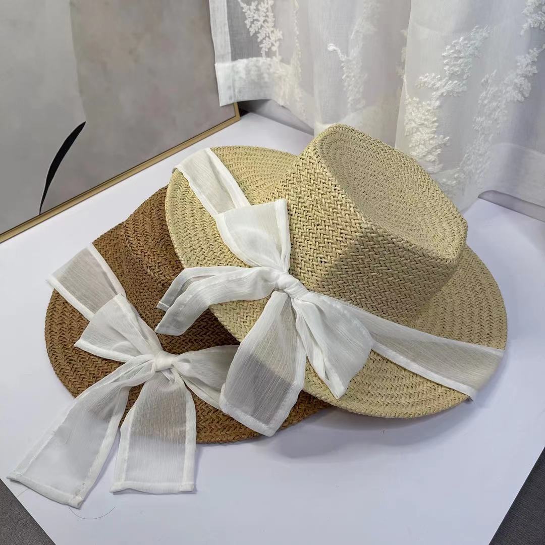 A female hat with a spring and summer ribbon, butterfly sash, hexagonal straw hat, Korean street style, anti-ultraviolet sun hat, and a wide-brimmed hat detail image 5