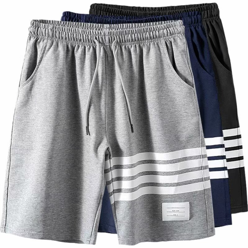 Pantalones de hombre de verano nuevos pantalones de hombre casuales transpirables pantalones cortos delgados marca de moda de tamaño grande suelto cuatro barras deportivas