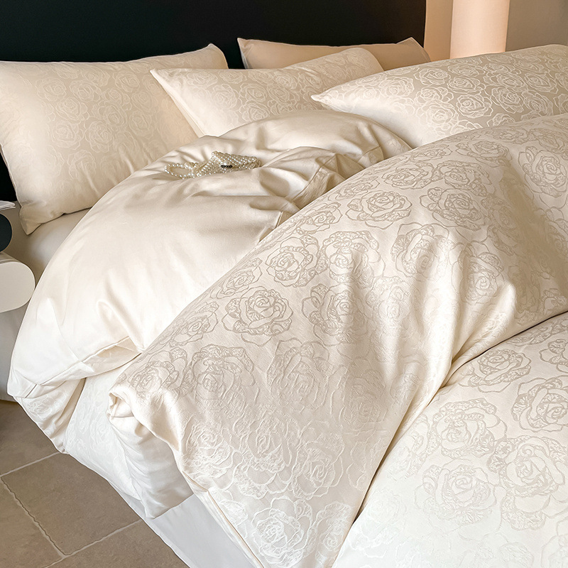 Cama de algodón de cuatro piezas 2025 nuevo estilo satén de lujo ligero algodón funda edredón sábana ropa de cama de tres piezas ropa de cama