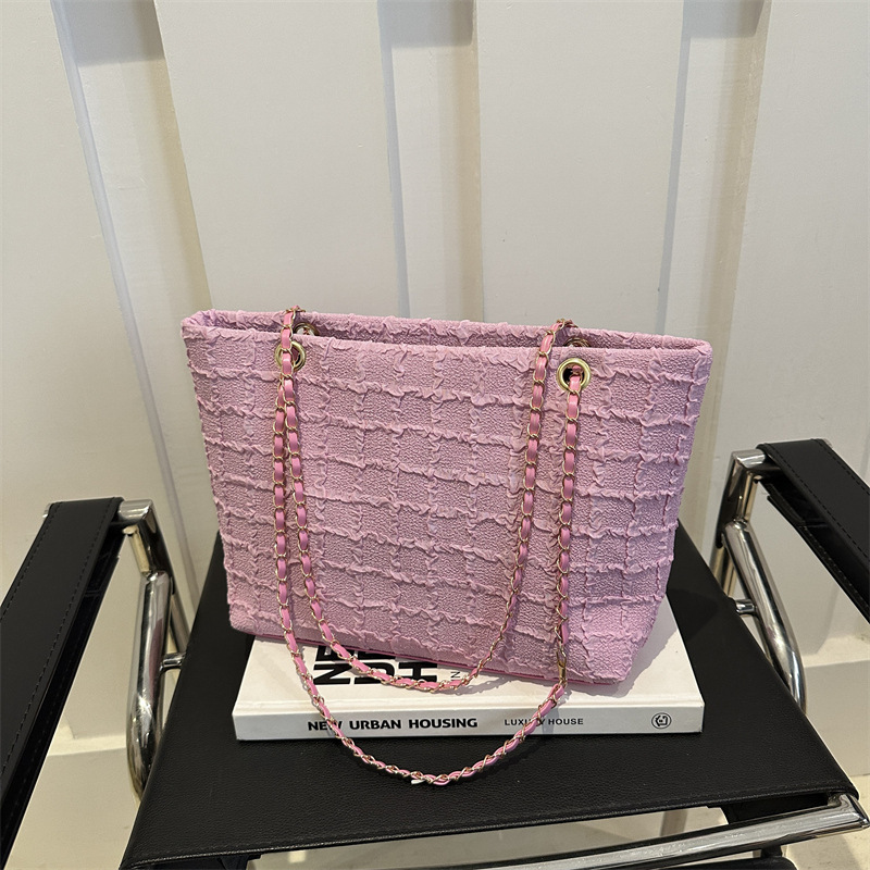 Bolso de moda de moda de estilo extranjero 2024 verano nuevo bolso de viaje casual simple cadena mochila simple