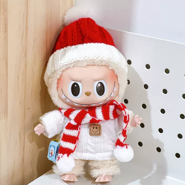 White red sweater, colored baseball cap, scarf