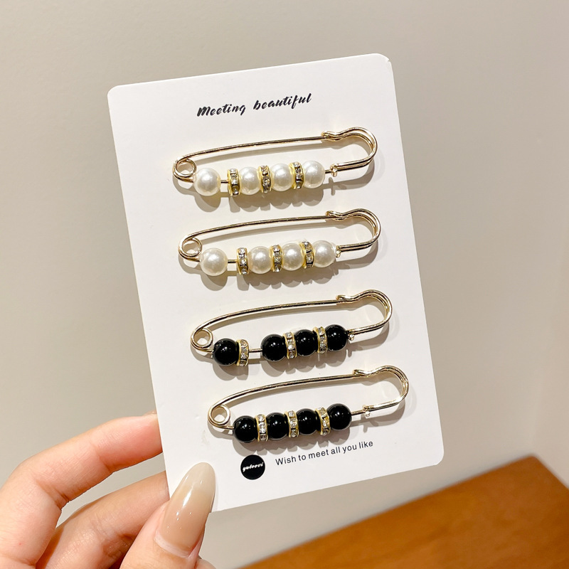 Falda con hebilla de cintura de perlas, circunferencia de cintura grande, cambio de artefacto, hebilla anti-luz, ropa, broche de diseño fijo