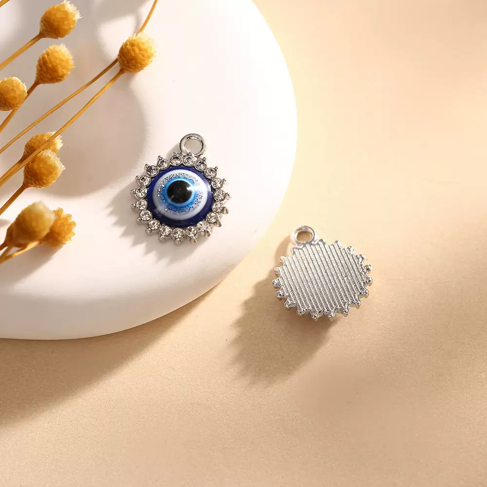个性合金太阳花恶魔之眼服饰配件diy项链吊坠饰品挂件厂家批发