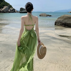フランスの緑の露背ストラップのワンピースの女性の夏のドーパミンの雲南の大理のタイの海辺の休暇のビーチのロングスカート