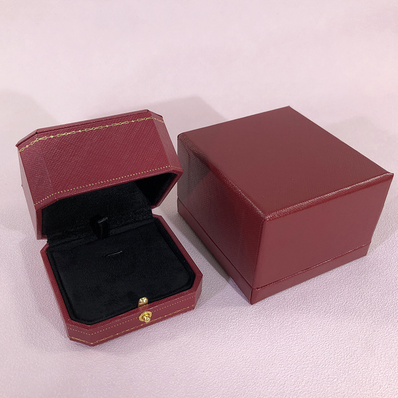 ヨーロッパ式のプリント八角形のアクセサリーの箱の赤いダイヤモンドの指輪の箱はボタンを押して指輪の箱の求婚の指輪の箱のメーカーに対して直接販売します。|undefined