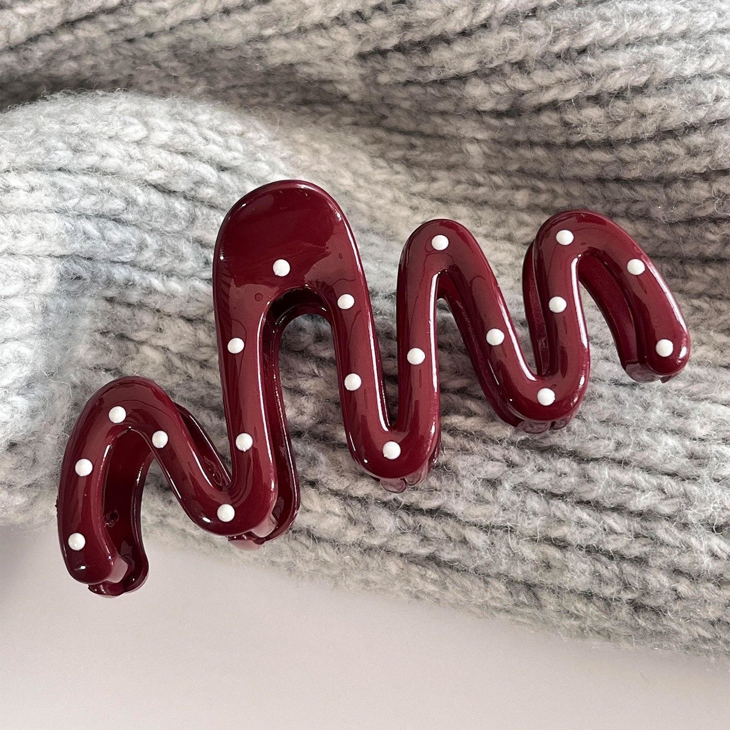 Red polka dot waves