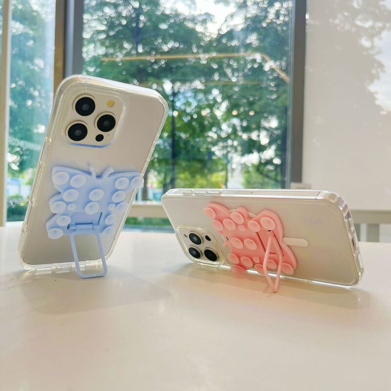 新しいシリコン吸盤携帯電話ホルダー怠惰なアーティファクトポータブルバタフライオールインワンユニバーサル折りたたみデスクトップホルダー卸売|undefined