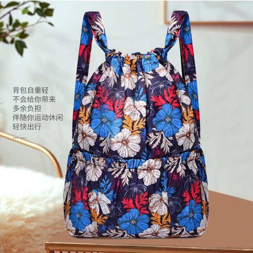 Cross-border floral fabric drawstring large-capacity backpack for women, foldable portable shopping bag, outdoor travel backpack