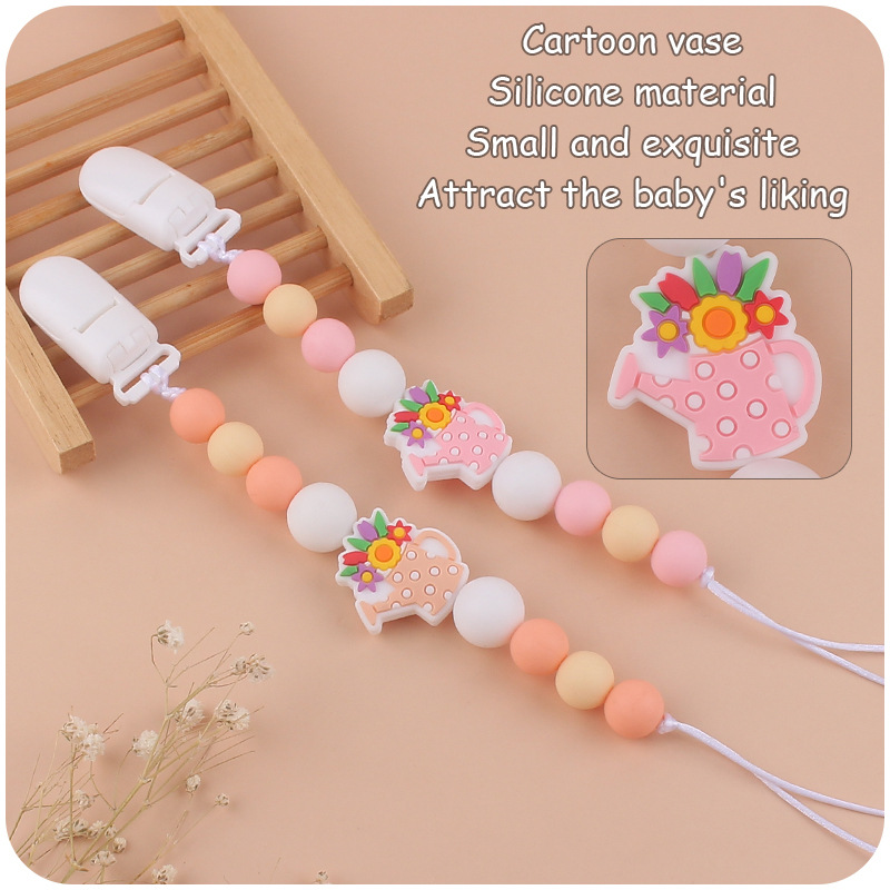 Bebé suministros de dibujos animados florero de silicona pequeño mordedor creativo DIY calmante bebé mordedura molar anti-gota cadena
