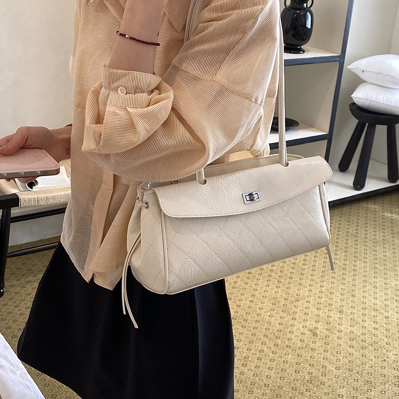 Liquero lujoso estilo diamante bordado bolso de brazo de mujer retro francés 2026 nuevo bolso de mano bolso de hombro universal