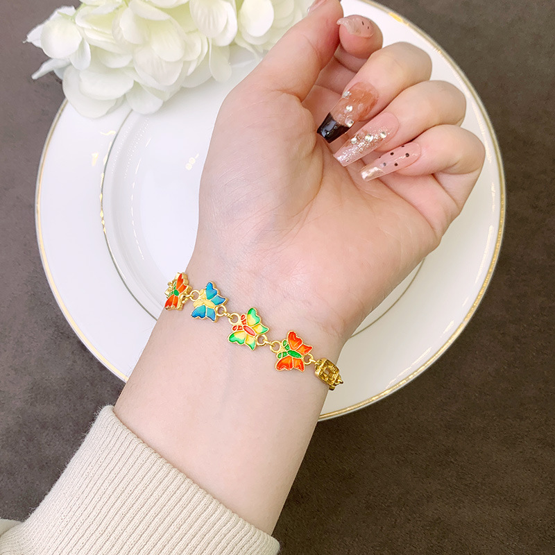 Guochao antiguo brazalete de oro de arena china esmalte de flores mariposa joyas de mano para mujeres simples no se desvanecen joyas