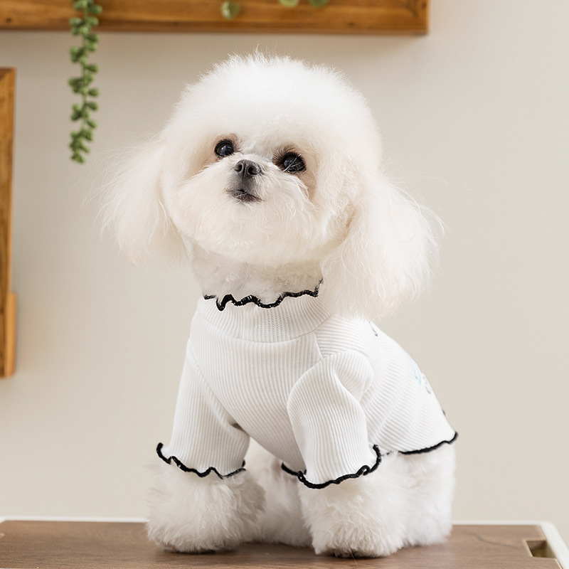 Primavera y verano perros delgados transpirables perros medianos y pequeños té de la tarde informal servicio a domicilio camisa de fondo de gato ropa para mascotas