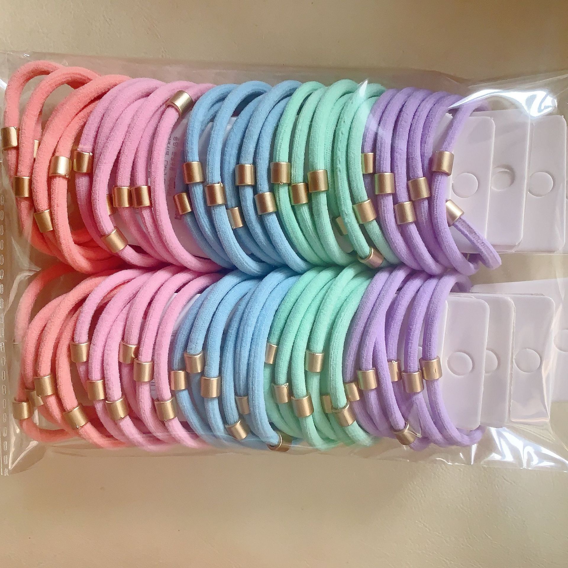 Dongdaemun estilo coreano hilo colorido accesorios para el cabello cuerda de pelo asequible banda de pelo de alta elasticidad de tres paquetes de banda de goma de dos yuanes tienda al por mayor image 15